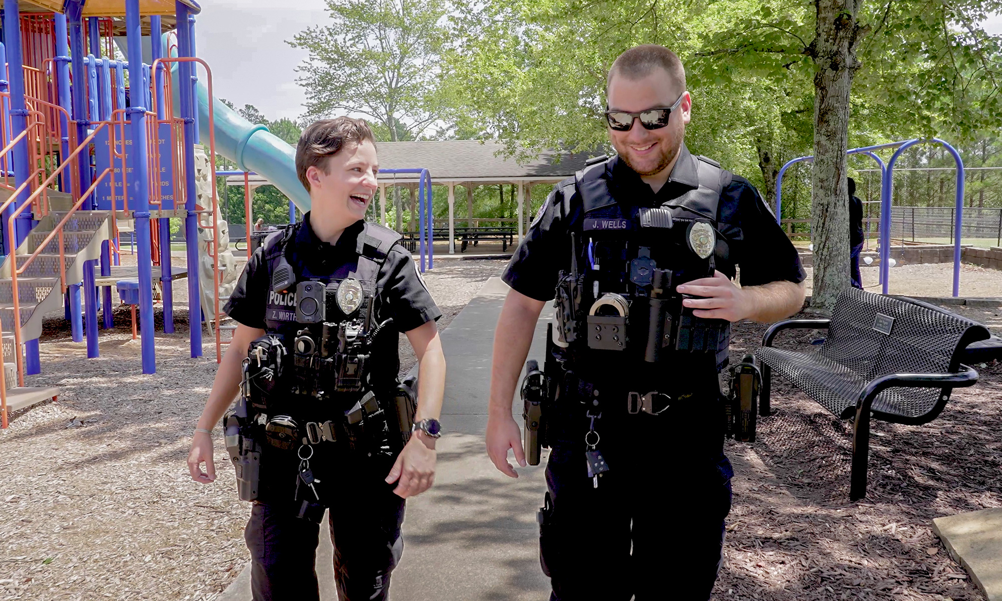 Roswell Police Officers laughing and having fun at park