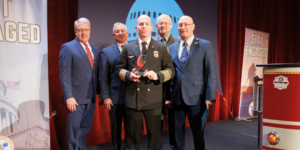 Chief Joe Pennino Receives Senator Paul S. Sarbanes Public Service Award for Roswell Fire Department.