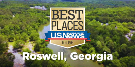The photo shows the U.S. News and World Report "Best Places to Live" badge with the words "Roswell, Georgia" underneath. A photo of the Chattahoochee River is in the background.