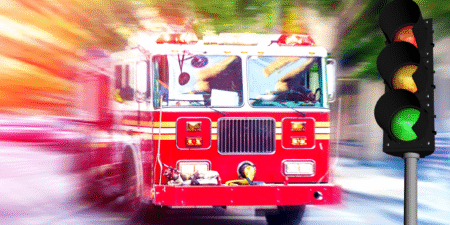 A fire truck rushes to the scene of an accident.