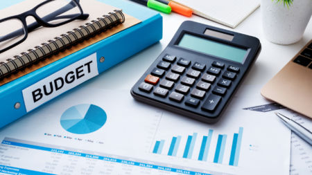 Community Workshops Provide Opportunity to Learn About City Budget Process Photo of budget book, calculator, and financial charts